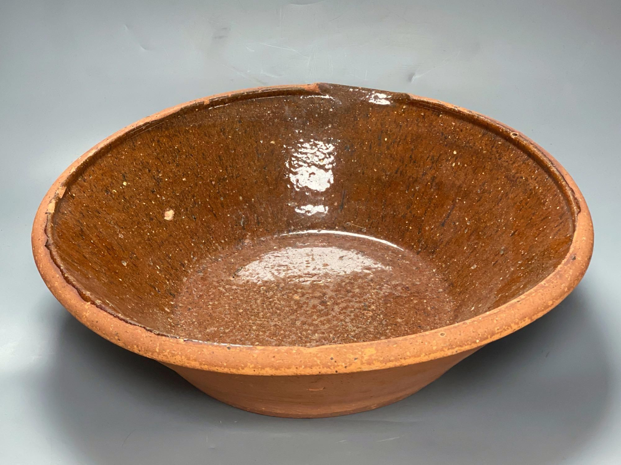 A 19th century Sussex terracotta basin